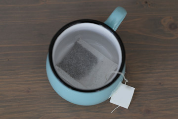 A cup of green tea on a coffee table