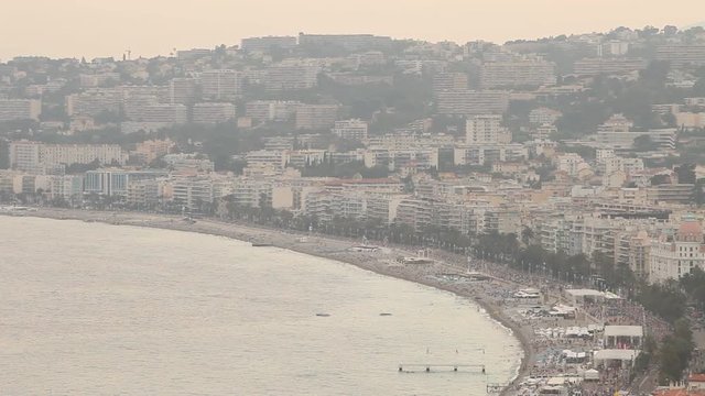 sunset, ocean, and city that is not sleeping