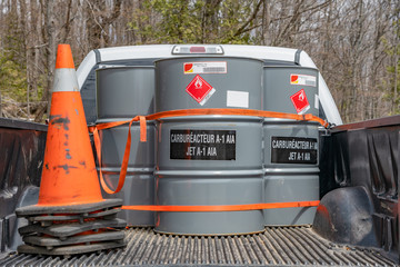 Jet fuel barrels in pick up truck