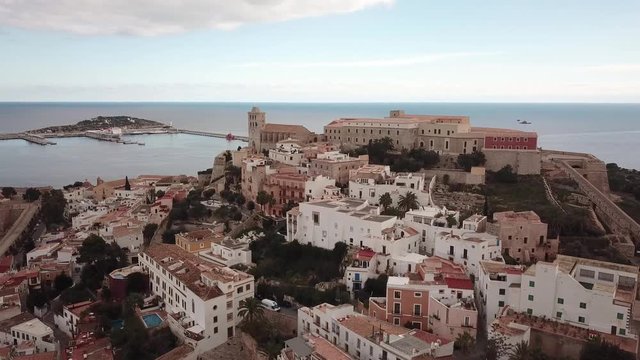 Aerial video of Ibiza Eivissa surrounded by medieval walls in Spain