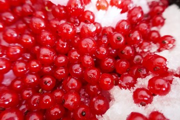 red currant berries with sugar  background.Red currant jam.Summer berry. Canned berries.