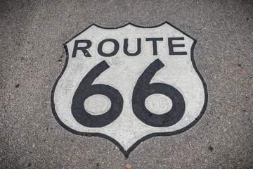 Fototapete Route 66 The famous route 66 highway shield painted on the road  © jaflippo