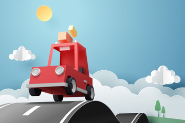 Paper art of red car jumping on mound, origami and travel concept