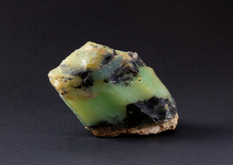 Piece of Andean green opal mineral from Peru. Opal is a hydrated amorphous form of silica classed...