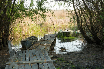 old plank dilapidated berth and wooden old boat