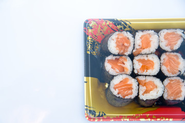 Sushi Roll with salmon on the white background .Food abstract background