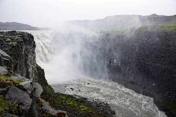 Dettifoss waterfall Icleand, snowfall in summer