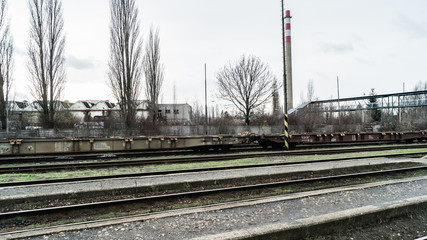 Fototapeta na wymiar train station and crumbles unused industrial area