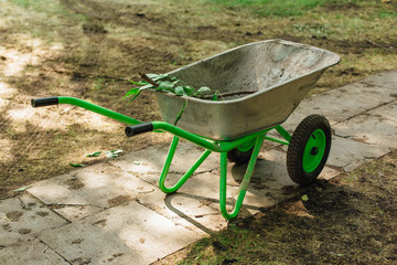 Iron trolley for manual moving of building materials in the garden and in the backyard