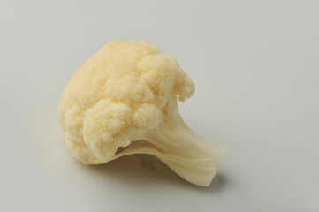 Fresh cauliflower isolated on a gray background