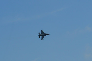 A fighter aircraft flying for display