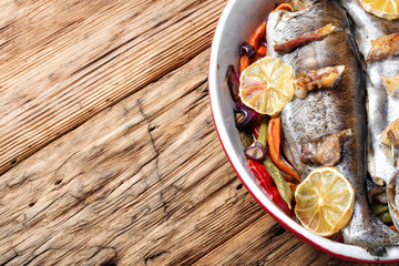 Trout with bacon and vegetables