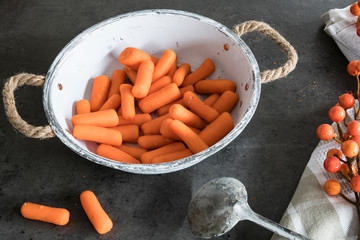 carrots in vintage white bowl