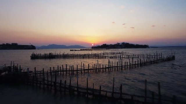A sunset view of the sea, sacheon sil-an sunset, Korea, wide drone shot