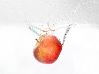 Red Apple spash in water