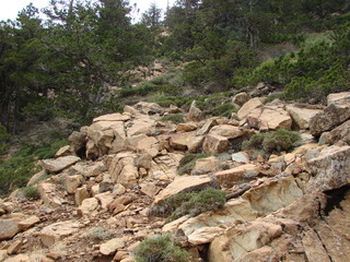 The dangerous rocky mountain path on the cliff of the mountain is fascinating and attracts mountain hunters.