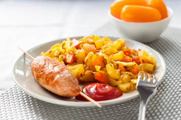 Stewed vegetables with turmeric and cumin and turkey kebab