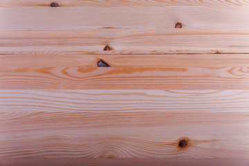 Fototapeta premium wooden board with a beautiful texture and knots as background