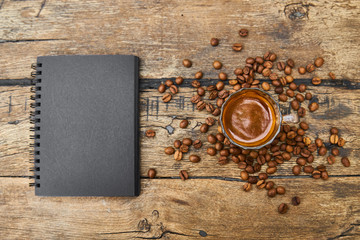 Coffee, coffee beans and notebook