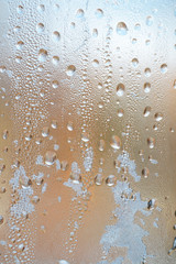 Raindrops on the glass. Depressive abstract background. Summer autumn bad weather