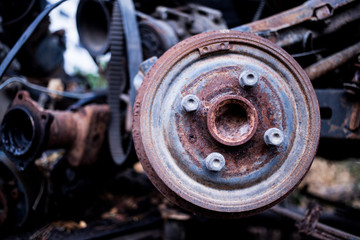 Parts of used cars sitting in junkyard