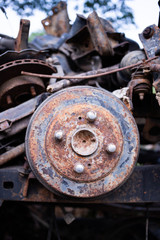 Parts of used cars sitting in junkyard
