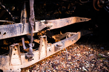 Parts of used cars sitting in junkyard