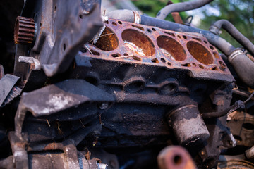 Parts of used cars sitting in junkyard