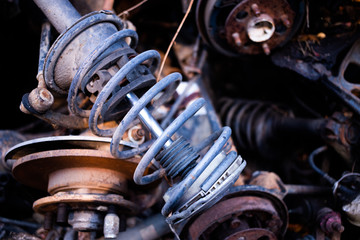 Parts of used cars sitting in junkyard