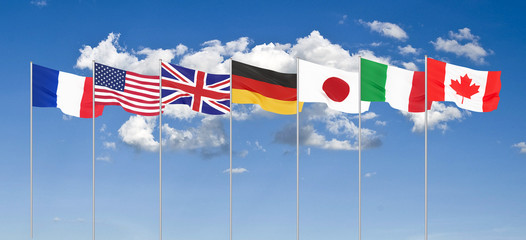 Silk waving G7 flags of countries of Group of Seven Canada, Germany, Italy, France, Japan, USA states, United Kingdom. Blue sky background. Big G7 in France 2019. 3D illustration.
