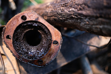 Parts of used cars sitting in junkyard
