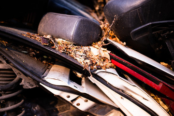 Useless, worn out rusty parts of used car