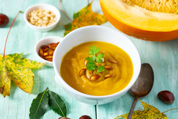 pumpkin soup on wooden surface