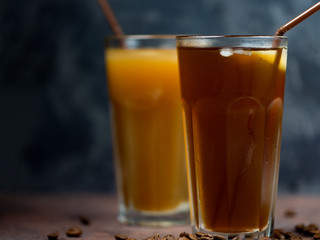 Two iced coffees . Summer cold coffee with milk and ice. copy space