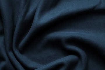 Naklejka na ściany i meble Background texture of dark blue fleece