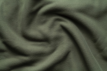 Texture of dark green fleece