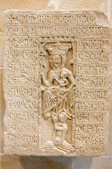 Fototapeta na wymiar an ancient religious stone carving