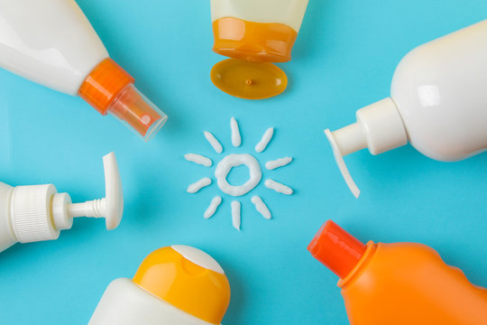 sunscreen remedy. various sunscreens and sun cream on a bright blue background. Sun protection. Ultraviolet protection. Summer. top view.