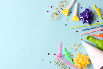 Accessories for a party or birthday on a colored background top view.