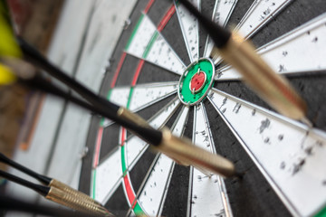 a typical darts game with no dart in the bullseye