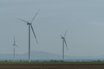 Windmills on a farm fields