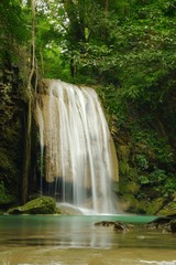 Fototapeta na wymiar Erawan Waterfall level 3 in Kanchanaburi Province, Thailand Deep forest Waterfall