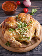 Grilled spatchcock chicken with garlic