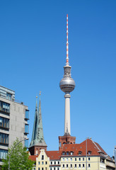 Berlin Television Tower and historical buildings Nikolai Church and the red town hall