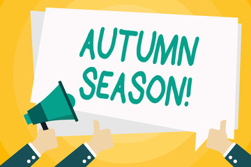 Text sign showing Autumn Season. Business photo text it is the season after summer, when leaves fall from trees Hand Holding Megaphone and Other Two Gesturing Thumbs Up with Text Balloon