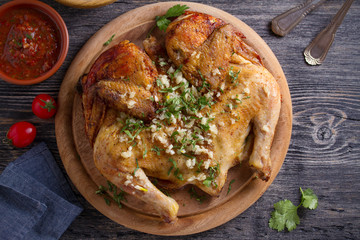Grilled spatchcock chicken with garlic