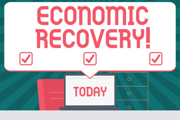 Handwriting text writing Economic Recovery. Conceptual photo rise of business activity signaling the end of a recession Blank Huge Speech Bubble Pointing to White Laptop Screen in Workspace Idea