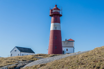 Fototapeta na wymiar Grasoyane Lighthouse at Ulsteinvik, Norway 15 april 2019
