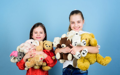 Happy childhood. Child care. Sisters best friends play. Sweet childhood. Childhood concept. Softness and tenderness. Laundry softener. Love and friendship. Kids adorable cute girls play soft toys