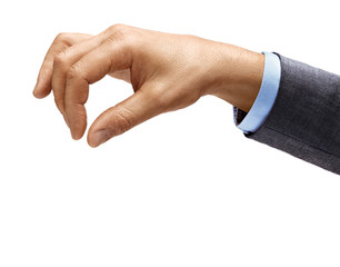 Man's hand in suit holds something isolated on white background. Close up. High resolution product.